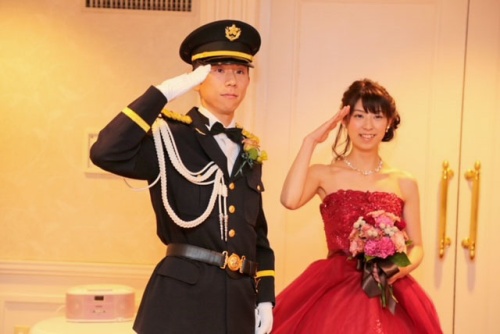 結婚式での坂口夫婦